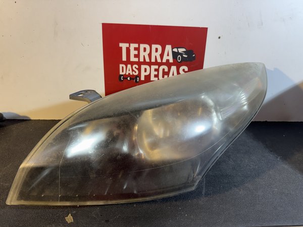 Farol Frontal Renault Megane III Esquerdo 260602446R fundo preto
