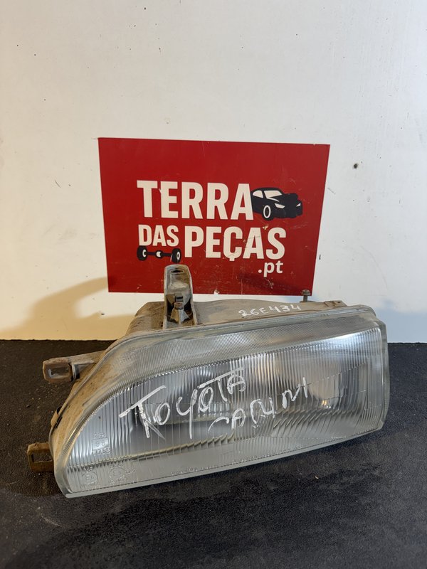 Farol Frontal Toyota Corolla E9 Esquerdo 082121130