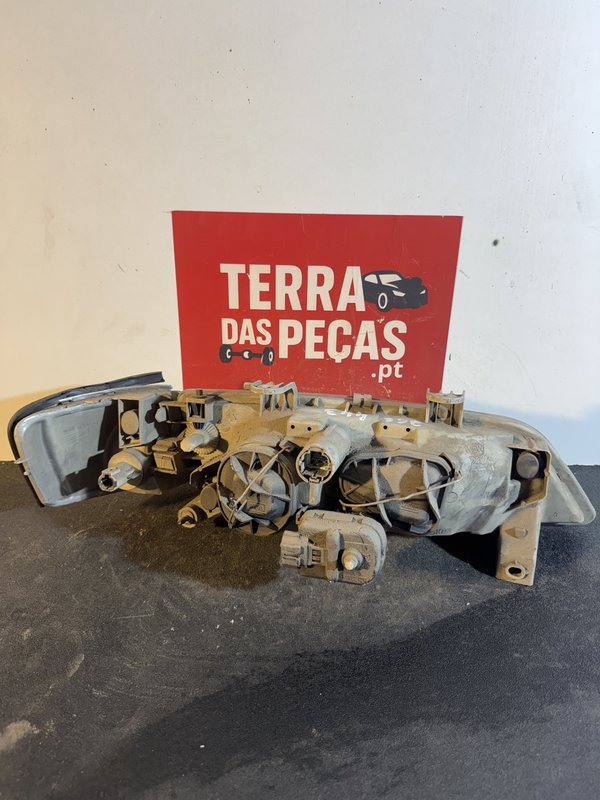 Farol Frontal Nissan Primera Esquerda 260609F125