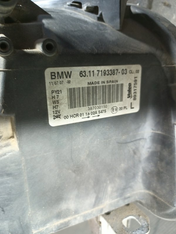 Farol Frontal BMW E81 Esquerdo 7193387 fundo preto