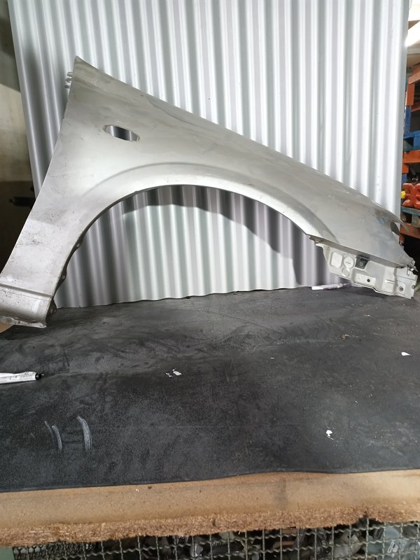 Guarda Lamas Nissan Almera MK2 DIREITO Cinza