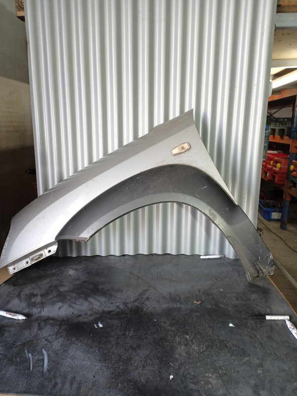 Guarda Lamas Hyundai Tucson MK1 ESQUERDO Cinza